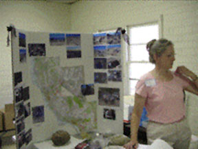California Minerals - A presenter with a project board about California Minerals